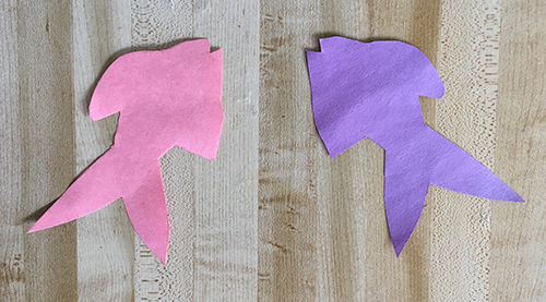 Pink and purple fish shapes cut out