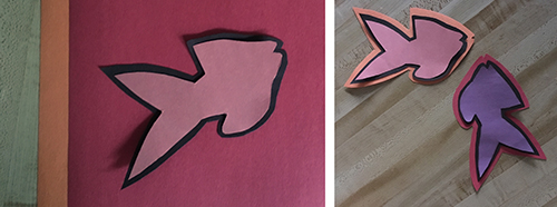 Left: Pink fish shape with black border on red paper background; Right: Pink and purple fish shapes with borders of multiple colors