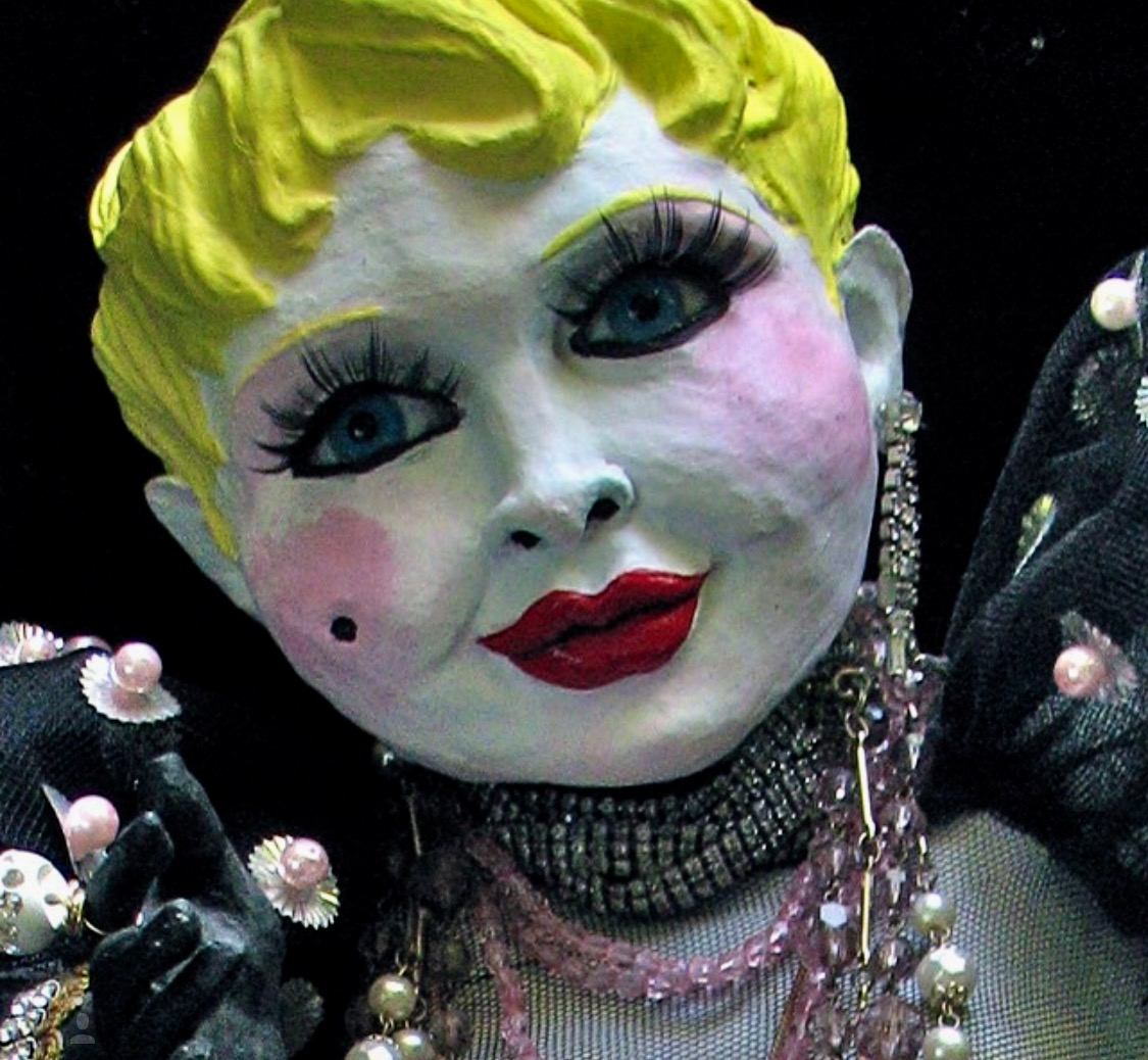 Close-up image of one of Greek Lankton's celebrity dolls