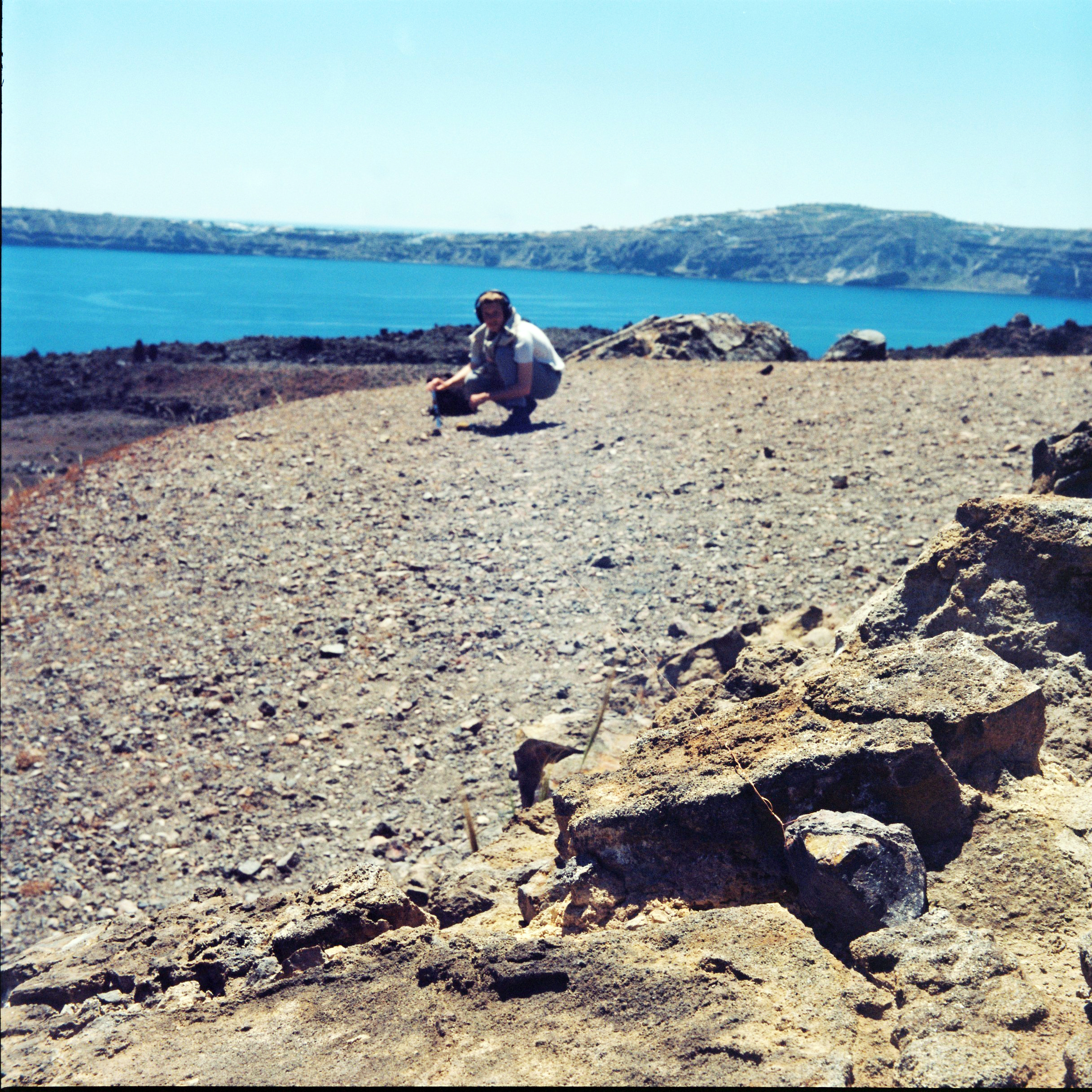 Tamm recording aeolian winds on Nea Kameni (Santorini’s volcanic crater) for Tympanic Tether; photograph by Hermione Spriggs, 2015