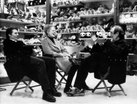 Eyes Wide Shut, directed by Stanley Kubrick, 1999, Tom Cruise, Nicole Kidman, and Stanley Kubrick during a break in shooting on the set. © Warner Bros. Entertainment Inc. Photo: Manuel Harlan