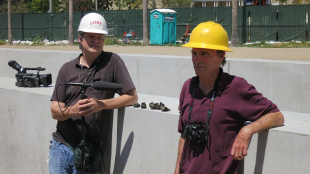 Doug Pray and Michael Heizer on construction site at LACMA for the sculpture Levitated Mass