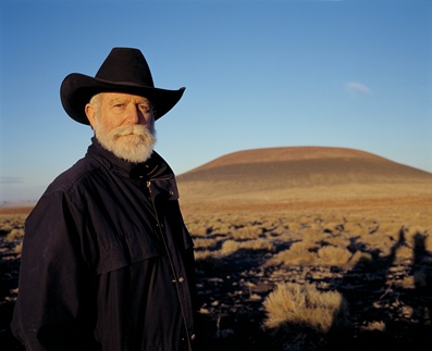 James Turrell in front of Roden Crater Project at sunset, October 2001, photo © Florian Holzherr