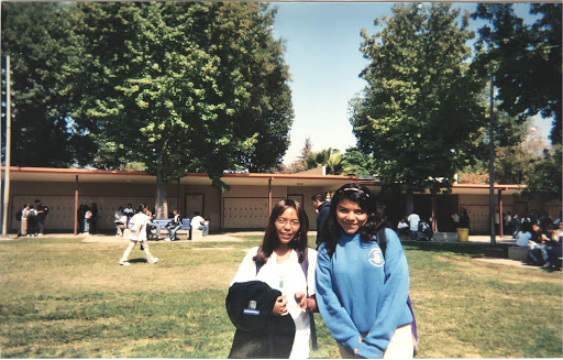 Polly standing with a friend in Middle School, photo courtesy of Polly Dela Rosa