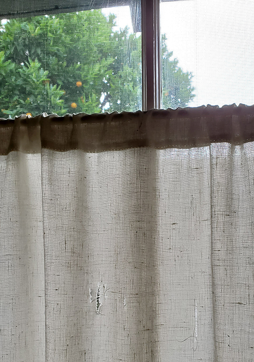 Curtains with a hole in them