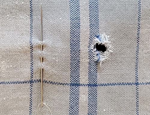 Left: needle through fabric in example of running stitch; Right: two thread options next to hole in fabric