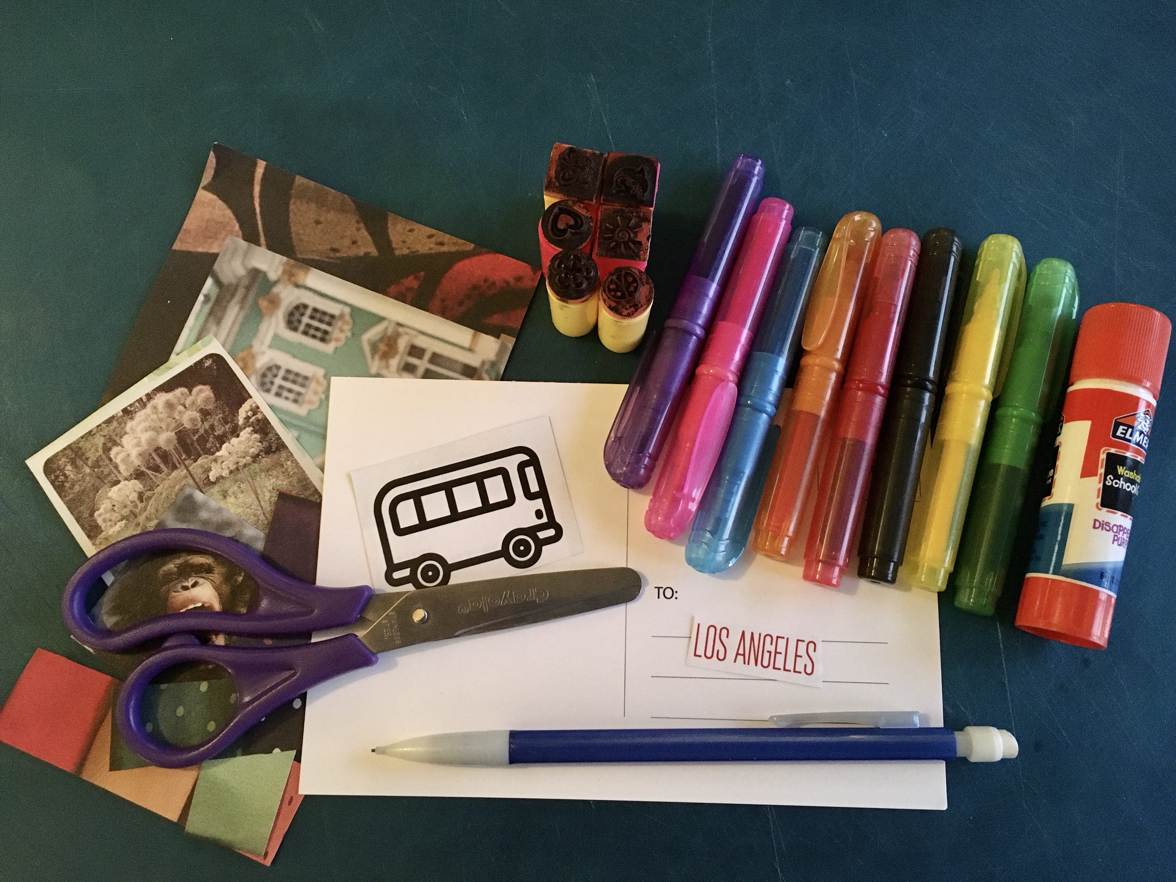 Postcard, markers, gluestick, scissors, and collage materials