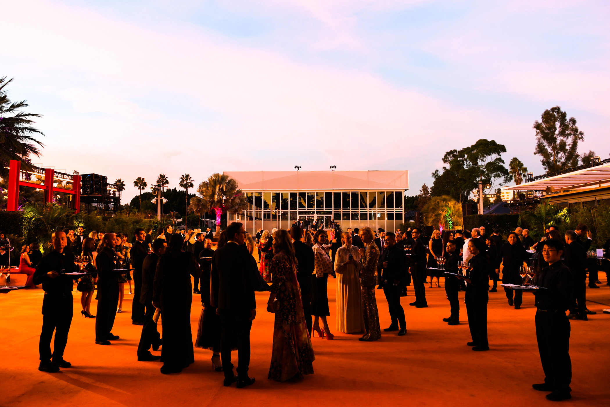 Guests enjoying cocktails during 2018 LACMA Art + Film Gala honoring Catherine Opie and Guillermo del Toro on November 3, 2018, photo © Billy Farrell/BFA.com