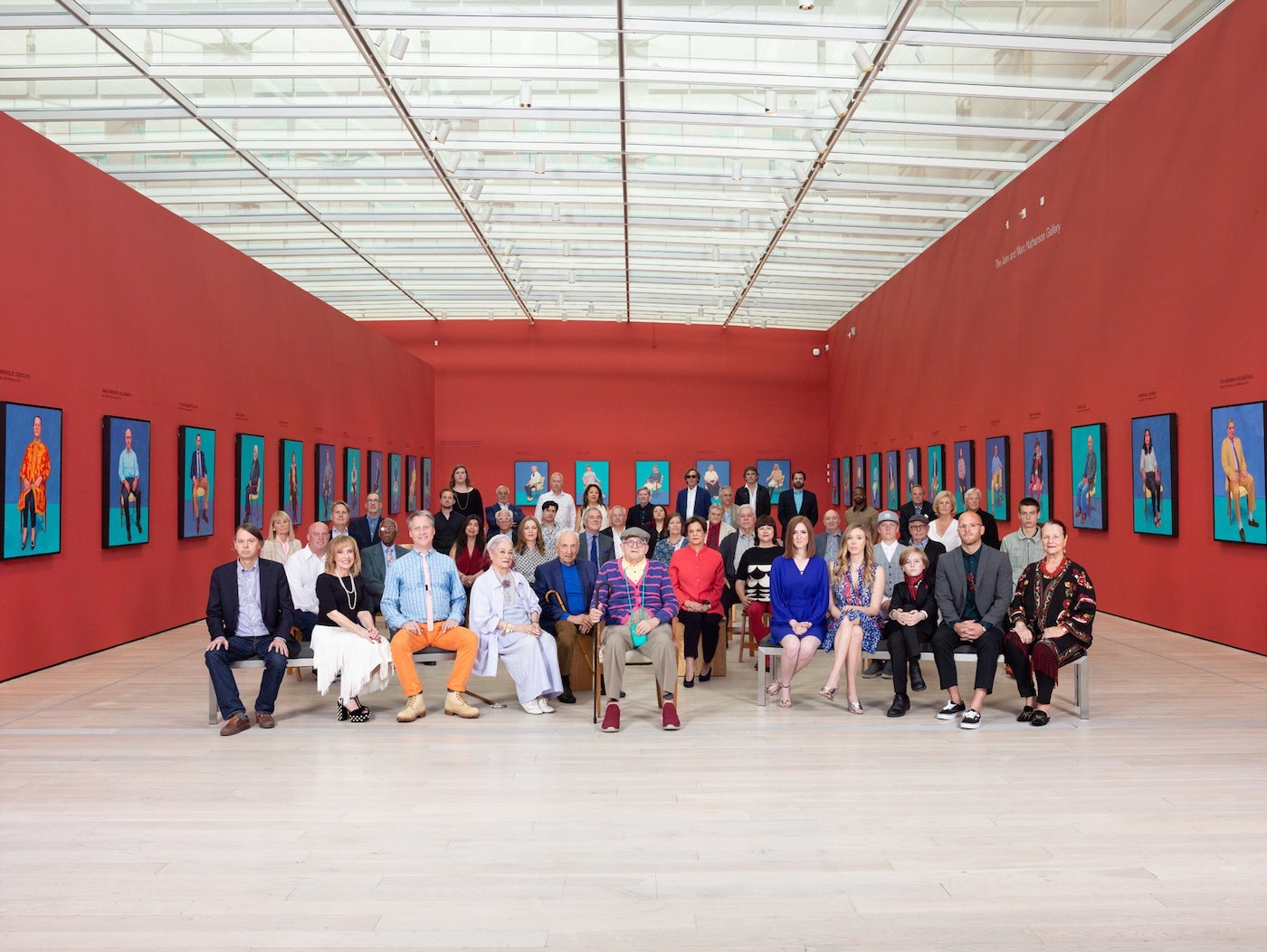 David Hockney and some of the sitters of 82 Portraits and 1 Still-life at the Los Angeles County Museum Art, April 11, 2018, photo © Catherine Opie, artwork © David Hockney
