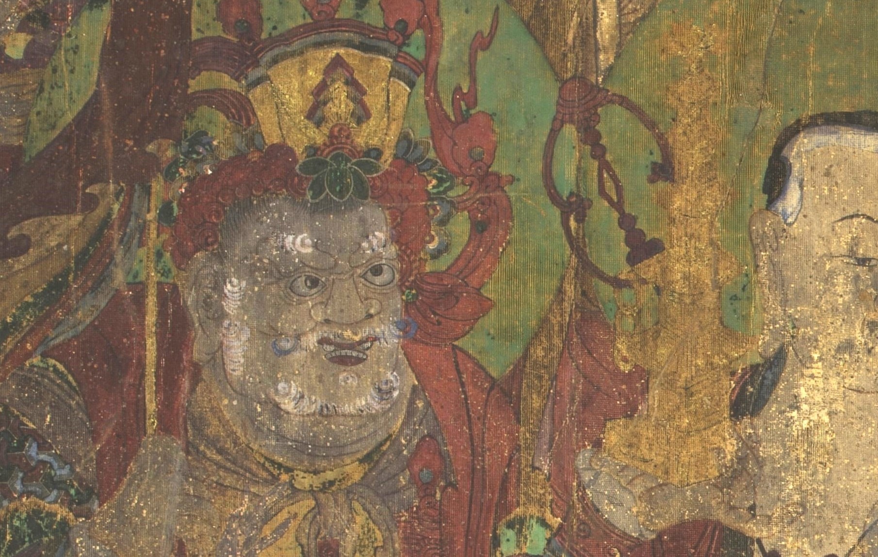 Detail showing traces of gold (possibly gold leaf) on items of Damun-cheonwang