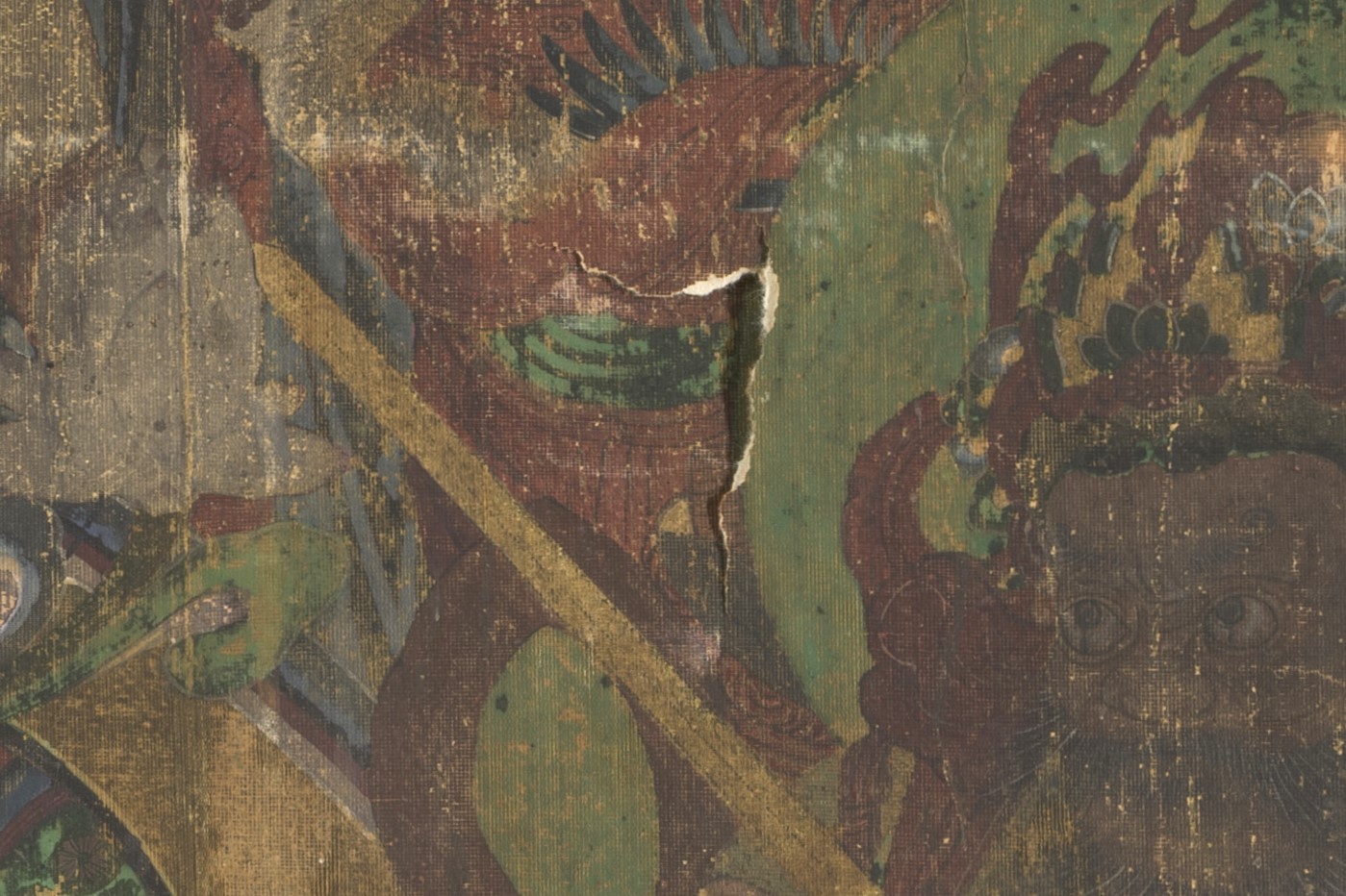 Detail showing punctured area of painting