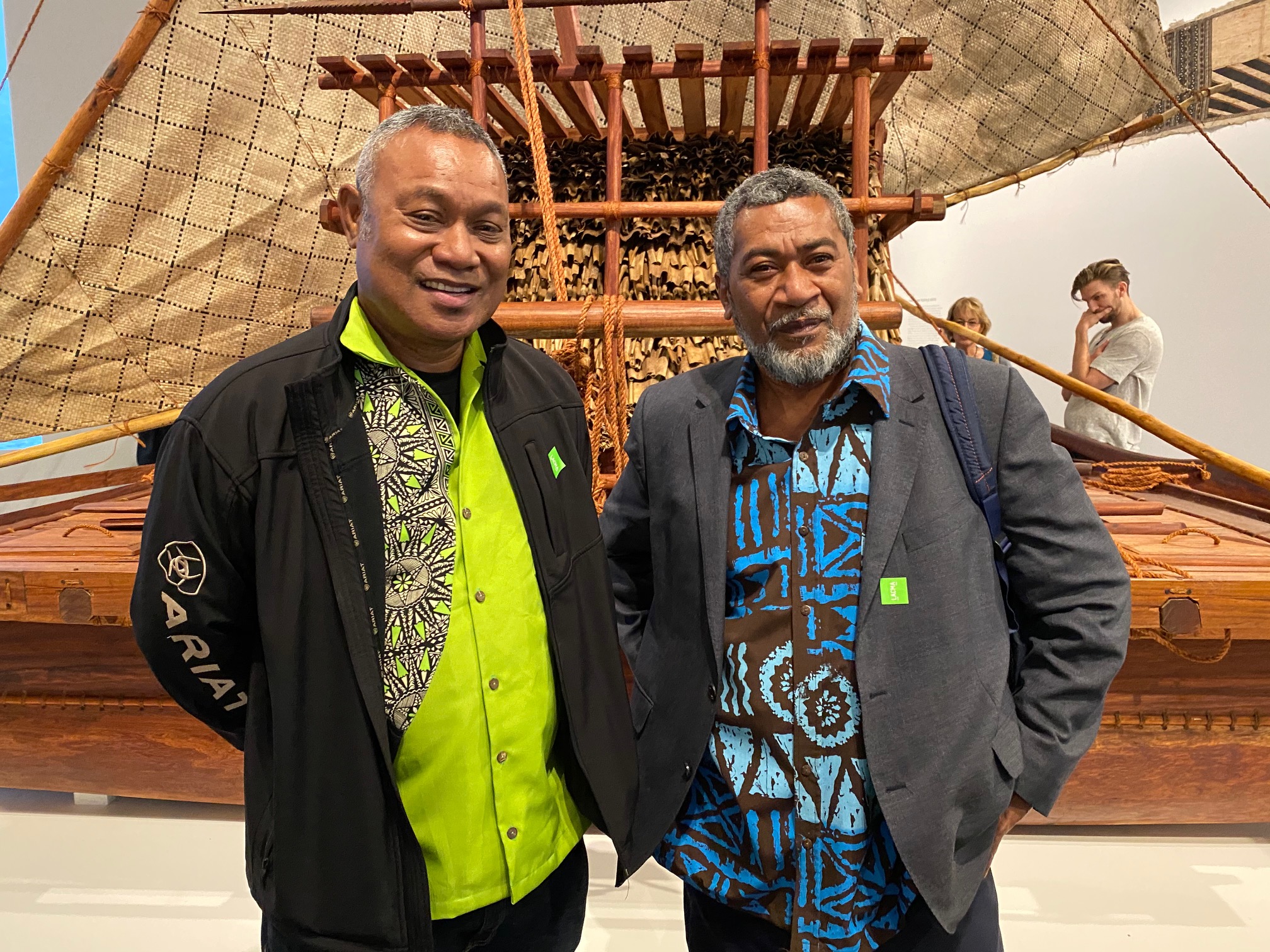Joji Marau Misaele (left) and Setareki Domonisere (right) in front of the drua they constructed in LACMA’s Fiji: Art & Life in the Pacific exhibition.
