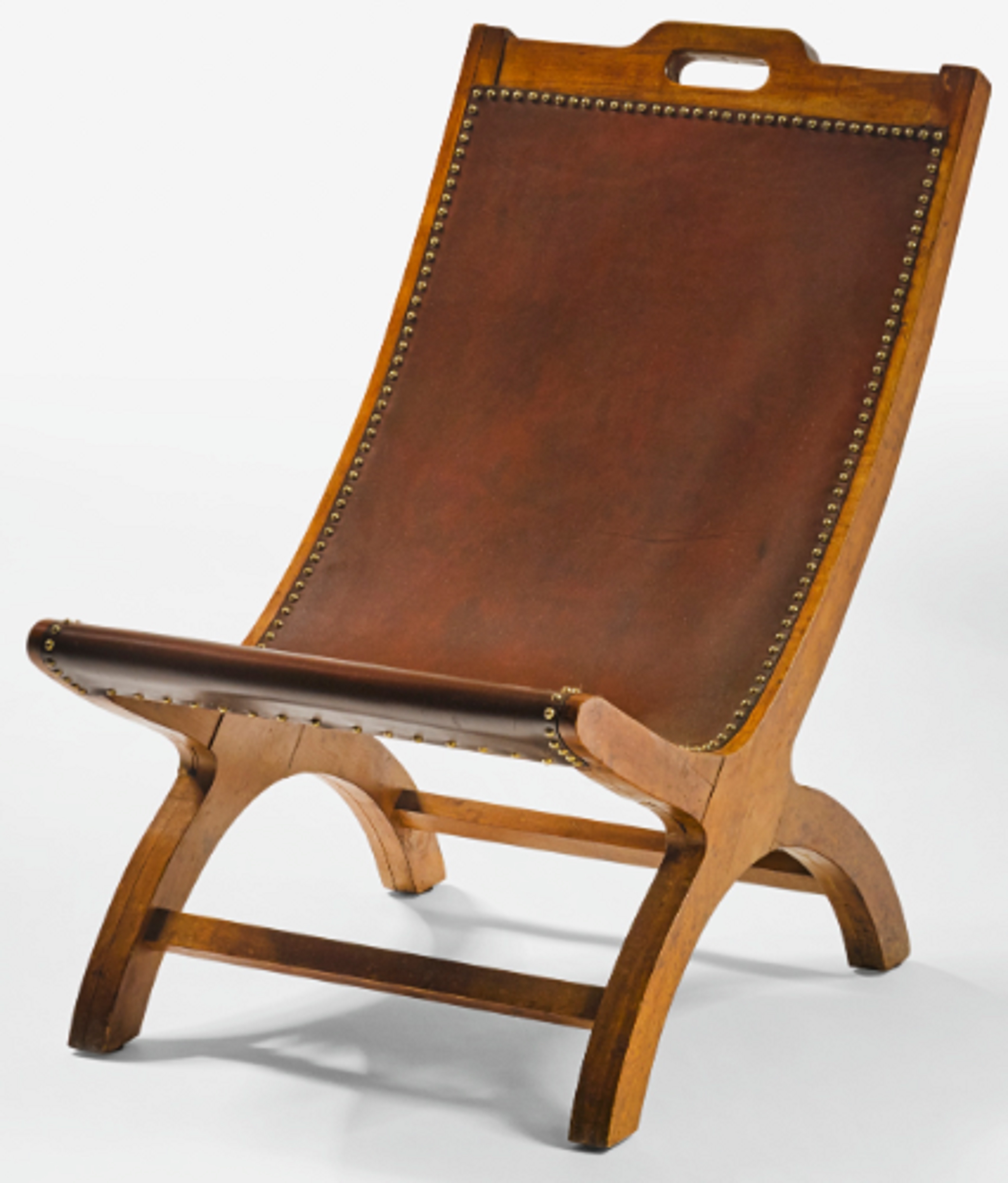 Josef Albers, designer; Mary “Molly” Gregory, maker; Mexican Chair A, c. 1940, ash, leather, brass, Los Angeles County Museum of Art, gift of the 2020 Decorative Arts and Design Acquisitions Committee (DA²) in memory of Peter Loughrey, with additional support from Alison and Geoffrey Edelstein, Suzanne Kayne, and Alice and Nahum Lainer, © The Josef and Anni Albers Foundation/Artists Rights Society (ARS), New York, courtesy The Josef and Anni Albers Foundation and David Zwirner