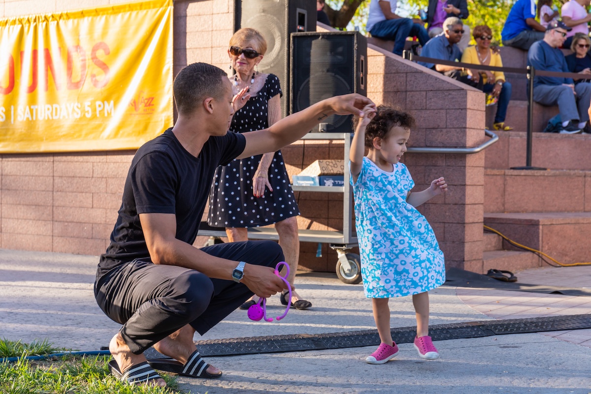 Visitors to Latin Sounds at Jackie Ferrara’s Dorothy Collins Brown Amphitheater (1999) in 2019, photo © Museum Associates/LACMA