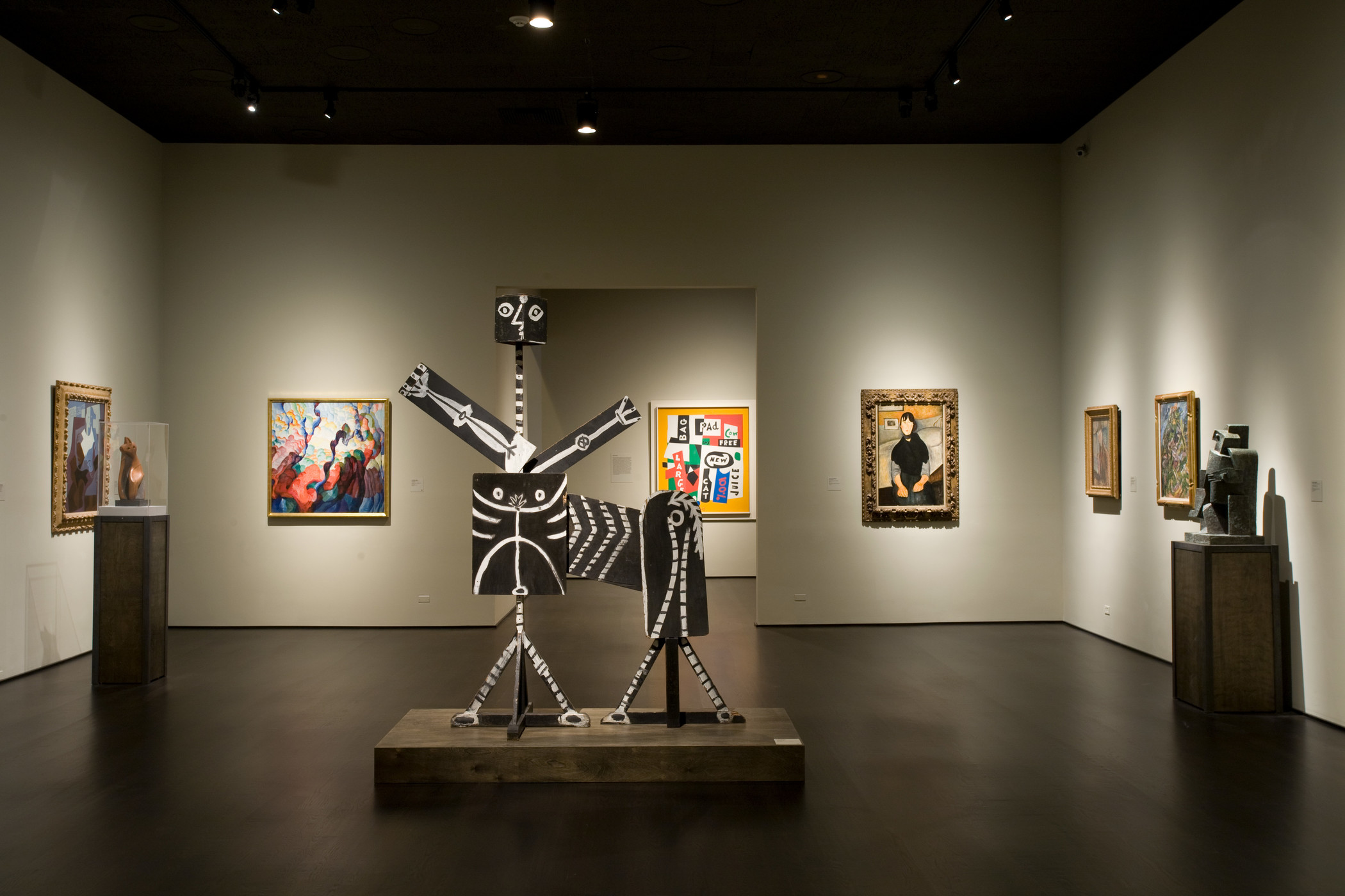 Paintings and sculptures in gallery