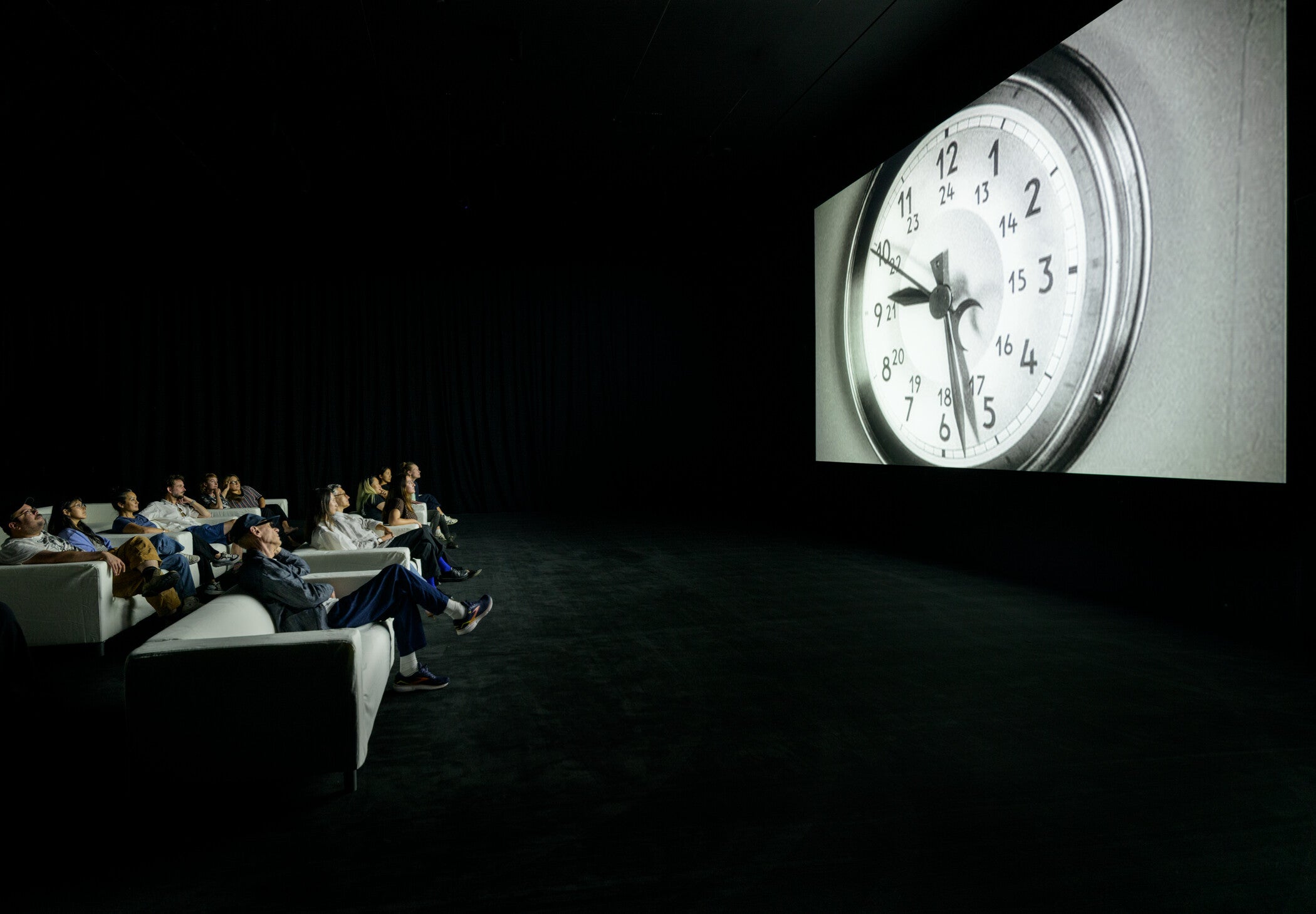 Installation photograph, Christian Marclay: The Clock, Los Angeles County Museum of Art, July 26–August 23, 2026, © Christian Marclay, courtesy Paula Cooper Gallery, New York and White Cube, London, photo © Museum Associates/LACMA, by Jonathan J. Urban