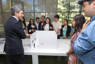 LACMA director and Wallis Annenberg CEO Michael Govan with the Andrew W. Mellon Summer Academy participants and their exhibition model. Photo © Museum Associates/ LACMA