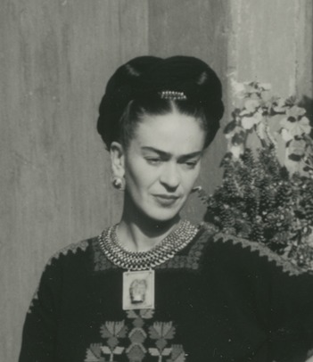 Photo by Florence Arquin of Frida Kahlo in Coyoacán, wearing a necklace made for her by Frederick Davis with a Tlatilco ceramic figure on a silver plaque (detail), 1949, photo: courtesy of Spencer Throckmorton, New York