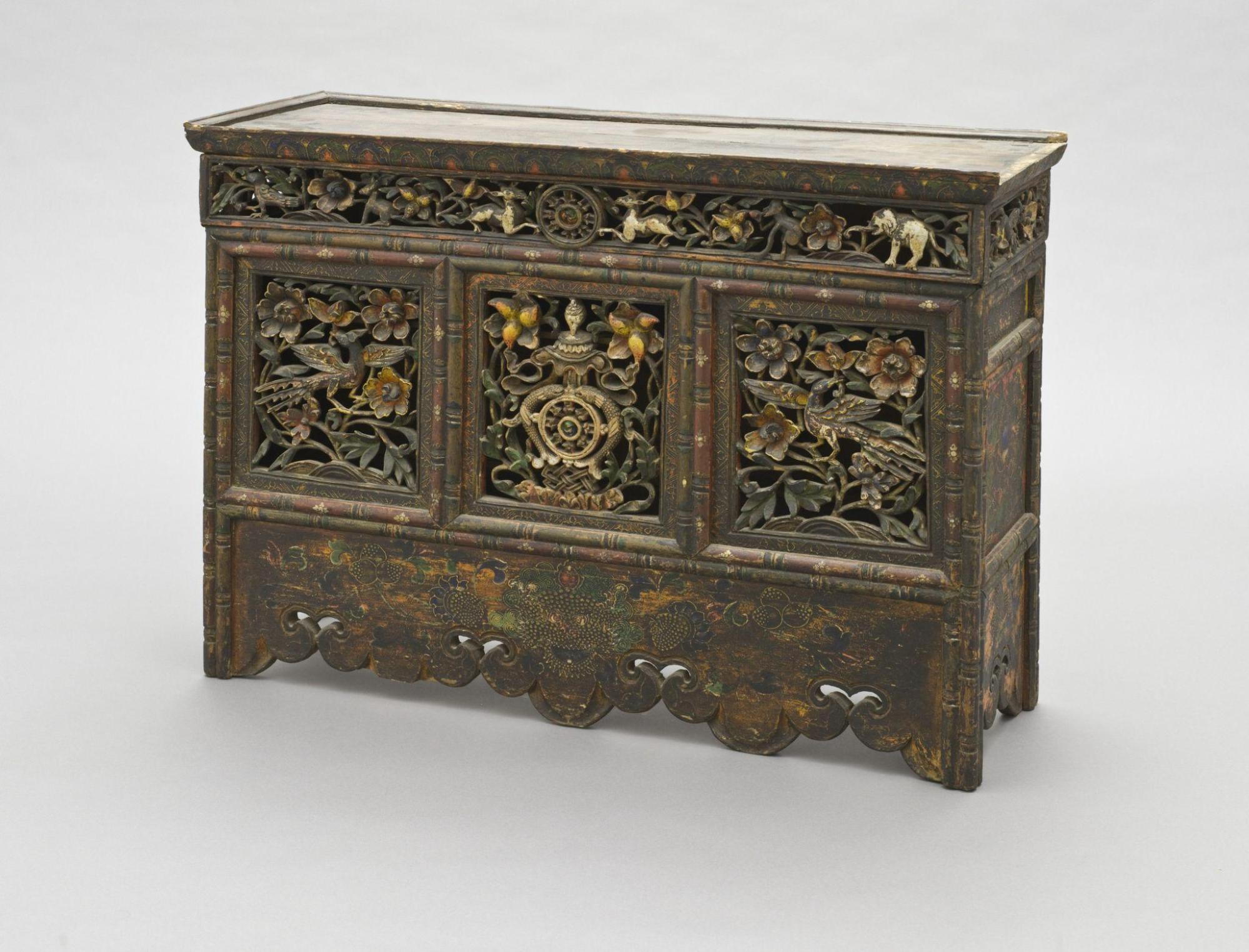 Altar Table with Auspicious Symbols, 19th century, Central Tibet, Los Angeles County Museum of Art, gift of Ruth Sutherlin Hayward and Robert W. Hayward in honor of the 18th birthday of the 11th Panchen Lama, Gendun Choekyi Nyima, and the continuation of the historic relationship between him and the Dalai Lama—as each other's teachers, photo © Museum Associates/LACMA