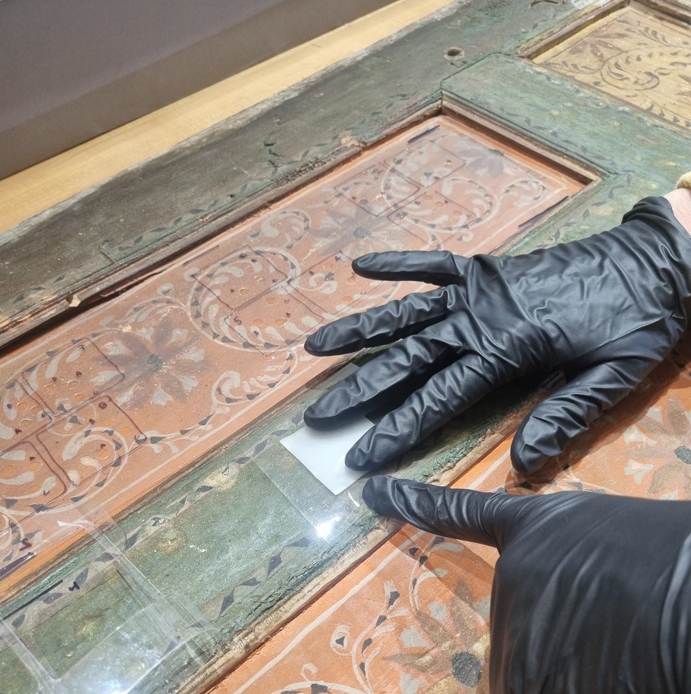 Ongoing cleaning test using a CSGI hydrogel loaded with adjusted water, performed on one of the soffits from the Damascus Room (AD 1766–67/AH 1180), photo © Museum Associates/LACMA by Chiara Biribicchi