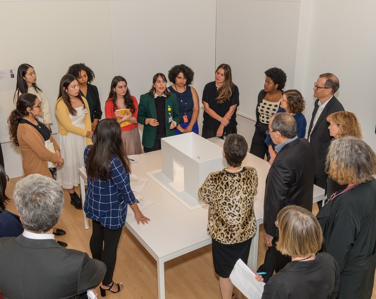 The 2019 Mellon Summer Academy group presenting their exhibition idea to the museum's director, the donor's family, and LACMA staff, photo © Museum Associates/LACMA