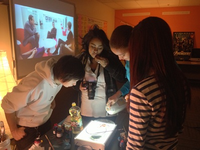 Students at HeArt Project Hollywood Media Arts Academy using vegetable oil and paint to create stop-motion animation inspired by the Star Gate sequence in 2001: A Space Odyssey