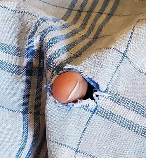 image of fabric with hole in it