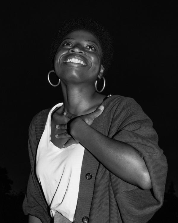 Black and white photo of smiling woman