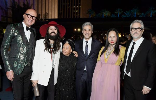From Left: Marco Bizzarri, Alessandro Michele, Honoree Betye Saar, LACMA CEO & Director Michael Govan, LACMA Trustee Eva Chow, and Honoree Alfonso Cuarón attend the 2019 LACMA Art + Film Gala presented by Gucci at LACMA on November 2, 2019, photo by Charley Gallay/Getty Images for LACMA