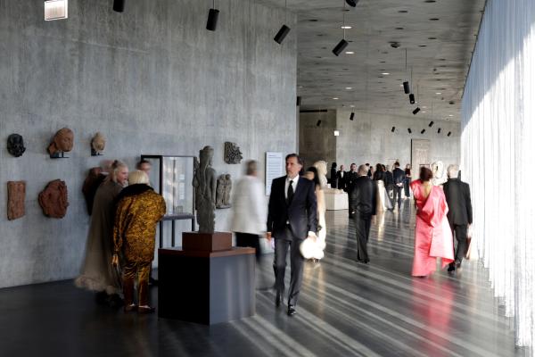 People walking inside the David Geffen Galleries