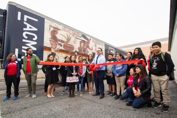 Principal Cuevas of Bell Gardens Intermediate cuts the ribbon on March 11, 2019, photo by Stephenie Pashkowsky