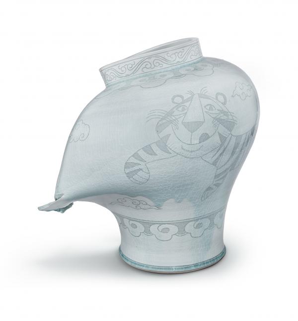 Pale blue vase with tiger design