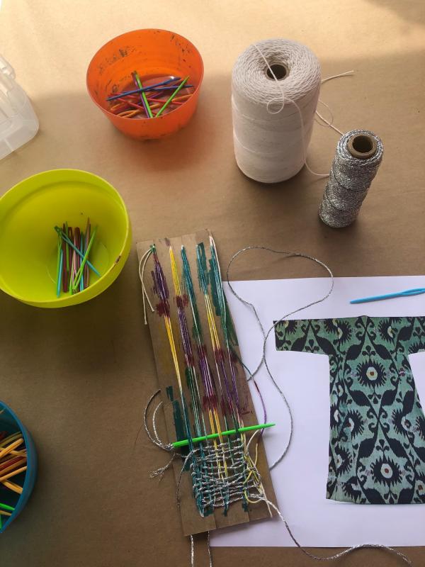 Weaving project during artist Julianna Ostrovsky’s workshop Fiber Painting Ikat Style at Andell Family Sundays