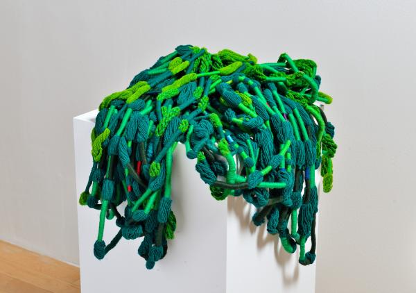 Photo of green textile sculpture