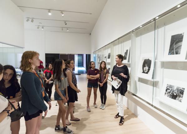 Eve Schillo with visitors in the Study Center for Photography and Works on Paper at the Los Angeles County Museum of Art