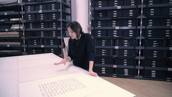 Analia Saban viewing the Sol LeWitt and Frederick Hammersley works she selected