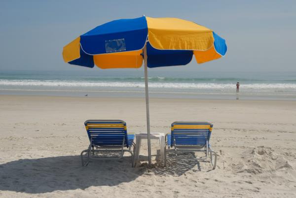 Beach Chairs and Umbrella, photograph by Paul Brennan (CC0)