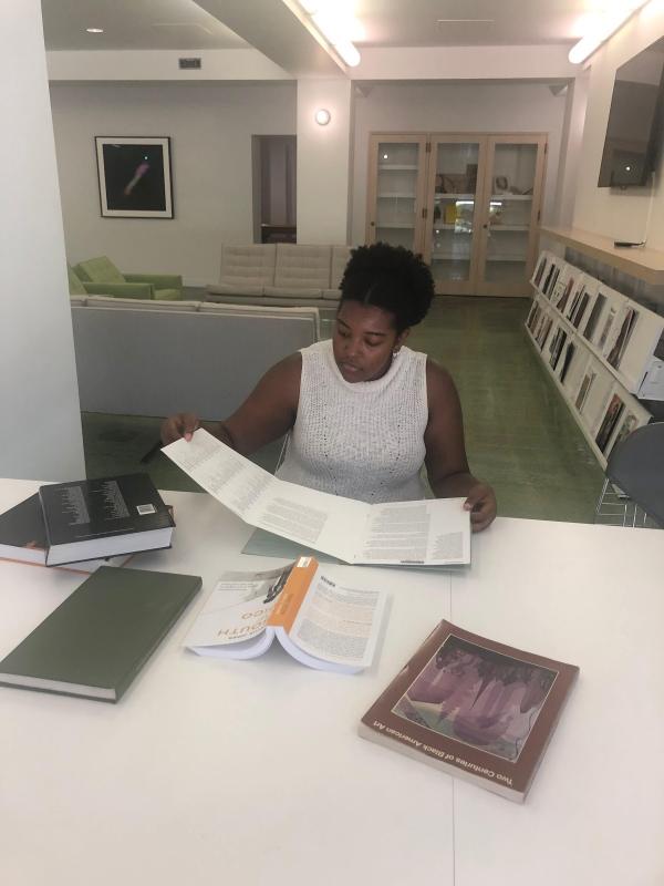 2018–20 Andrew W. Mellon Undergraduate Curatorial Fellow Jabrea Patterson-West engaged in archival research in LACMA's Balch Art Research Library, 2019