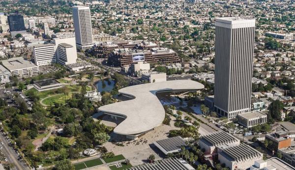 Aerial view of amorphous building in cityscape