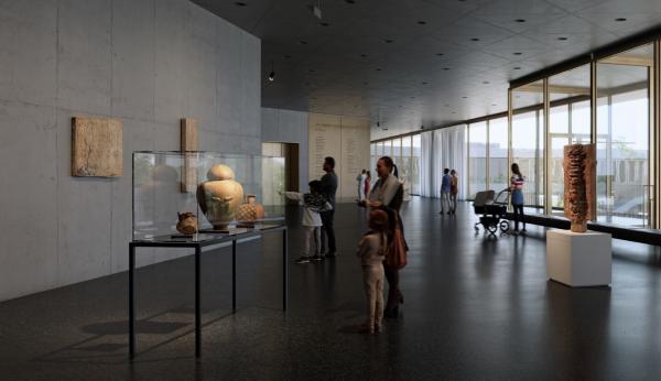 Visitors in art gallery with floor to ceiling windows on the right side of the image