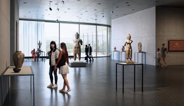 Visitors in airy gallery with floor-to-ceiling windows and artworks