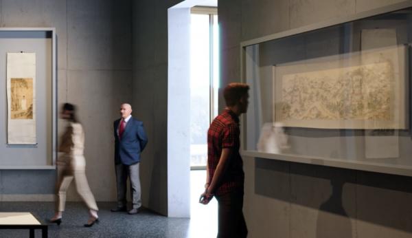 Rendering of visitors viewing Asian scrolls in a gallery