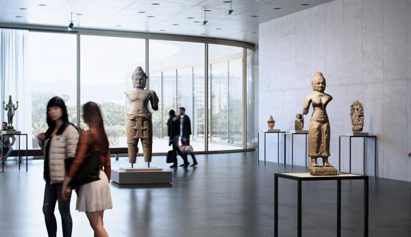 Visitors in an airy gallery with sculptures