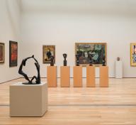 Sculptures and paintings in a gallery