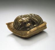 Attributed to Garaku School, Dog Sitting in Padded Basket, Japan, late 18th-early 19th century