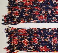 Warp ikat threads being examined by LACMA's Conservation team.