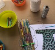 Weaving project during artist Julianna Ostrovsky’s workshop Fiber Painting Ikat Style at Andell Family Sundays