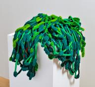 Photo of green textile sculpture