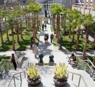 Visitor's in the B. Gerald Cantor Sculpture Garden, at the Los Angeles County Museum of Art