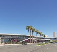 Rendering of building exterior and streetscape with palm trees